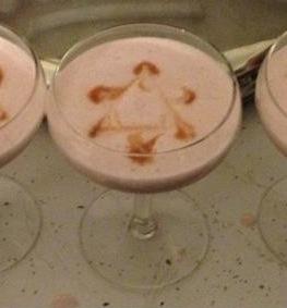 A poor resolution picture of the Pink Yente with a Star of David garnish made with Ango.